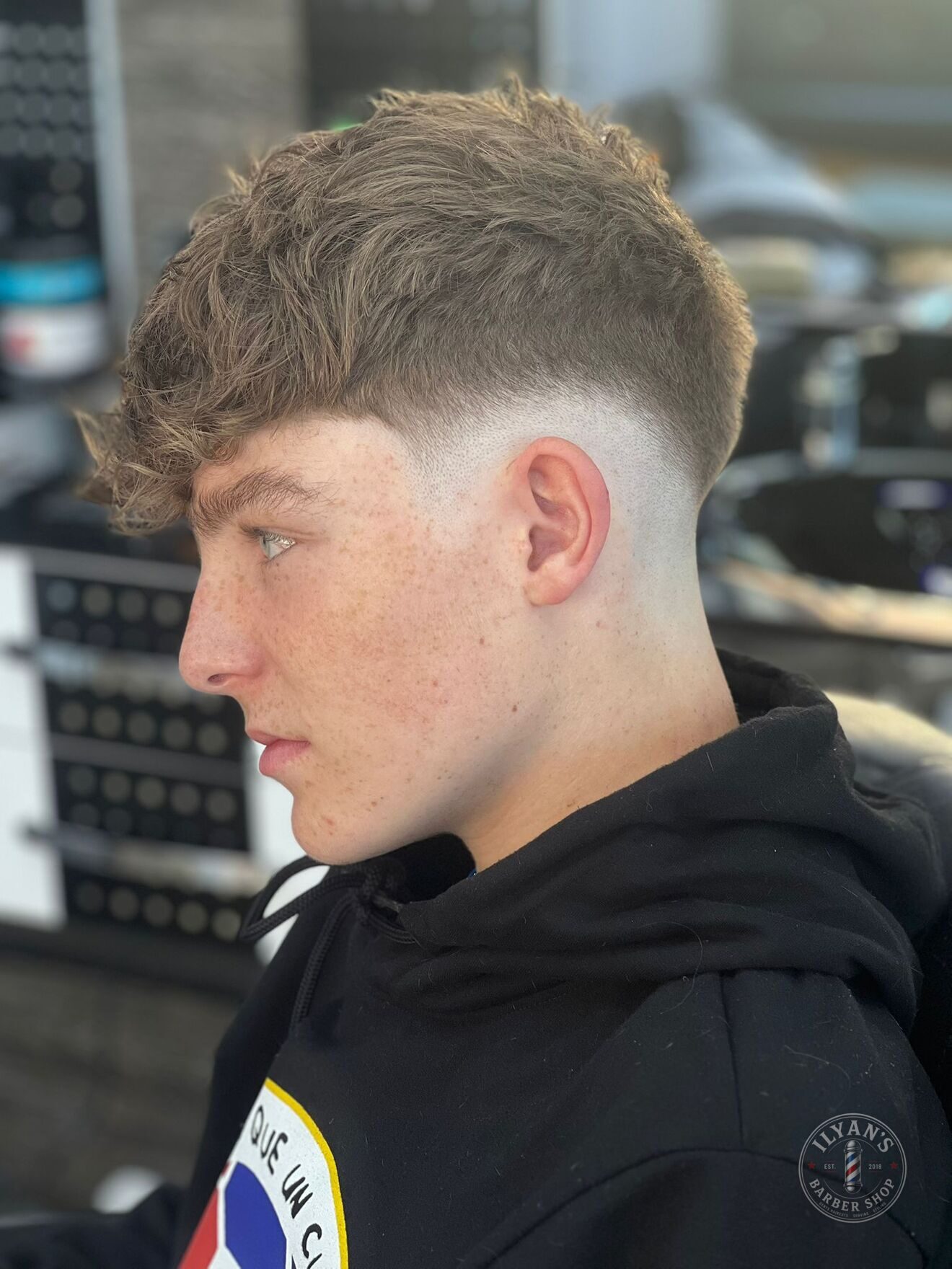 Textured Crop with Low Fade at Ilyan's Barber Shop