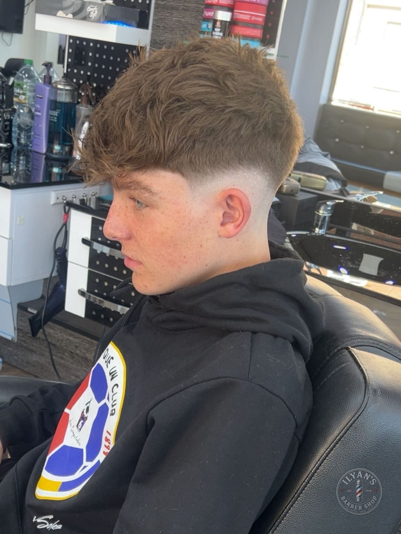 Textured Crop with Low Fade at Ilyan's Barber Shop