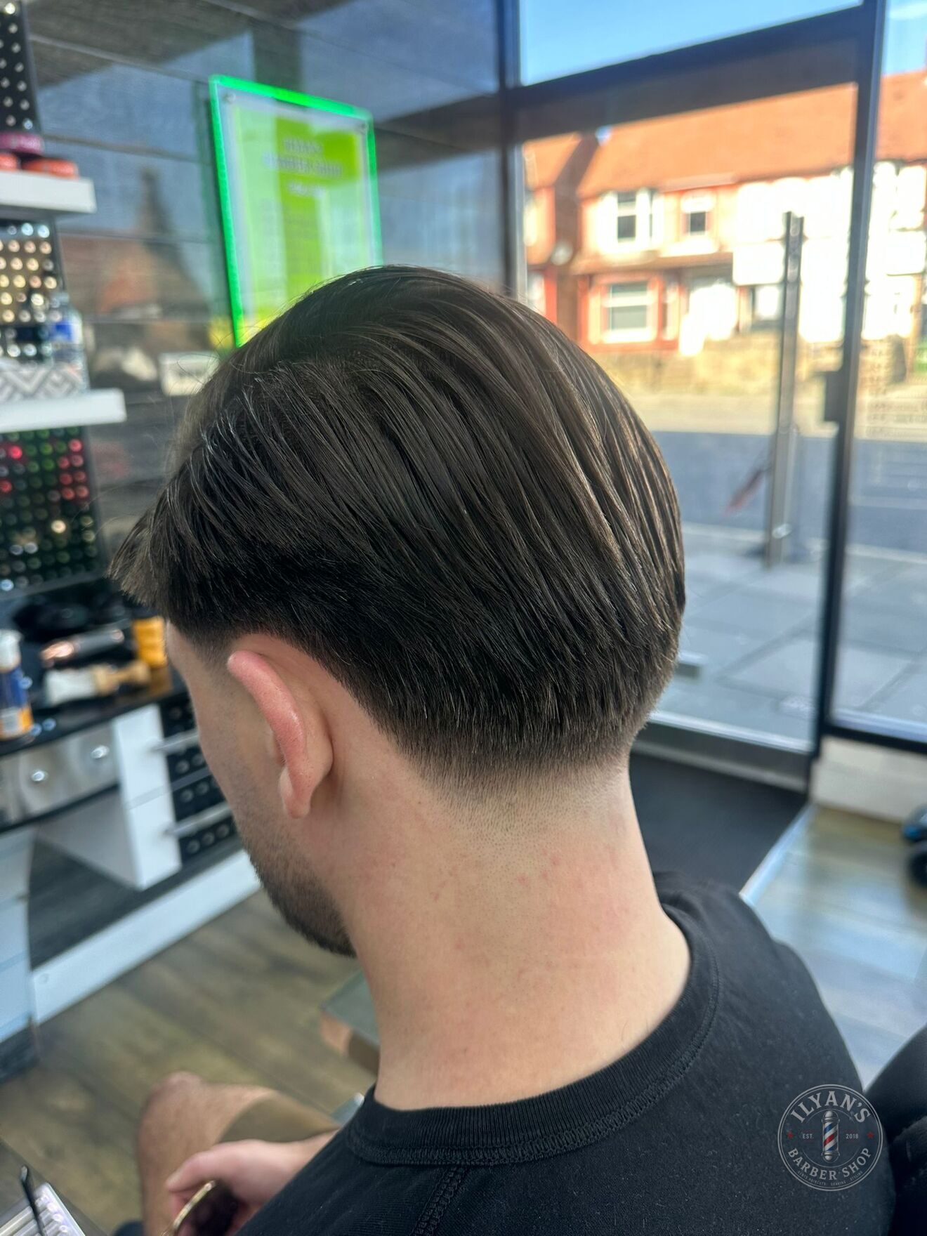 Slick Back Taper at Ilyan's Barber Shop