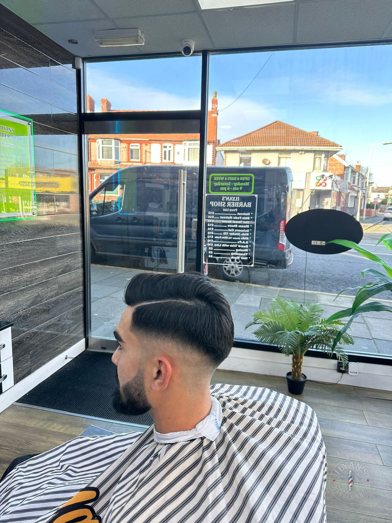 Slick Back Fade with Beard at Ilyan's Barber Shop