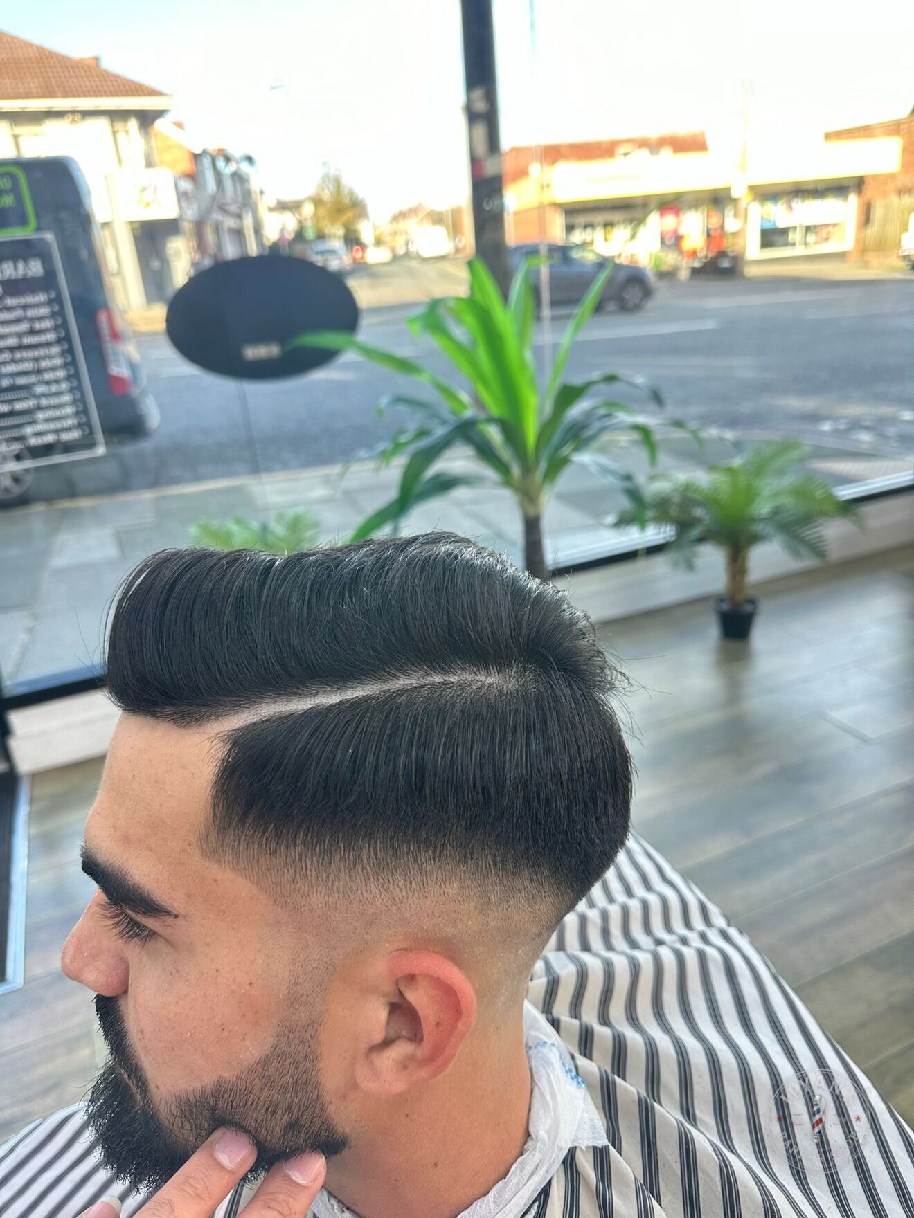 Pompadour Fade with Beard at Ilyan's Barber Shop