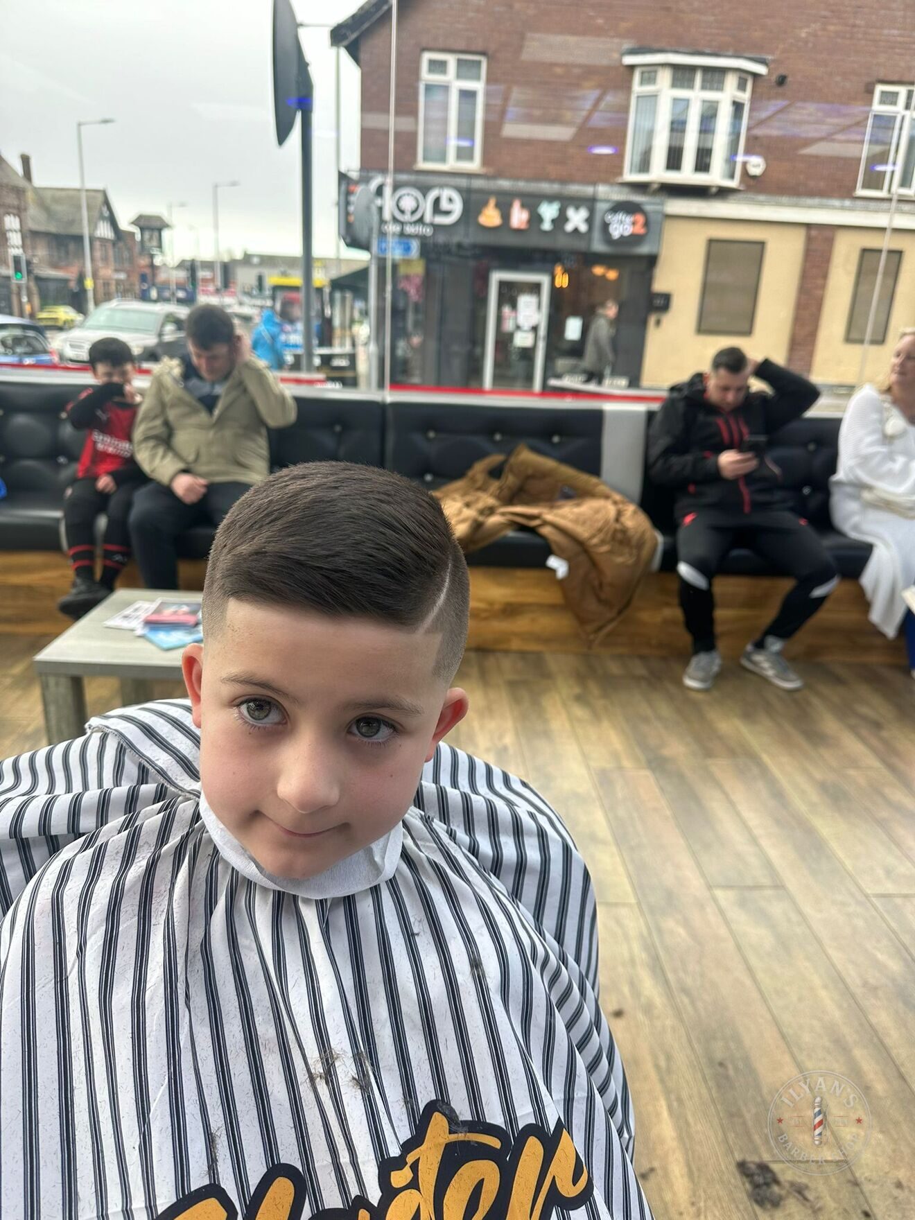 Kids Side Part with Skin Fade at Ilyan's Barber Shop