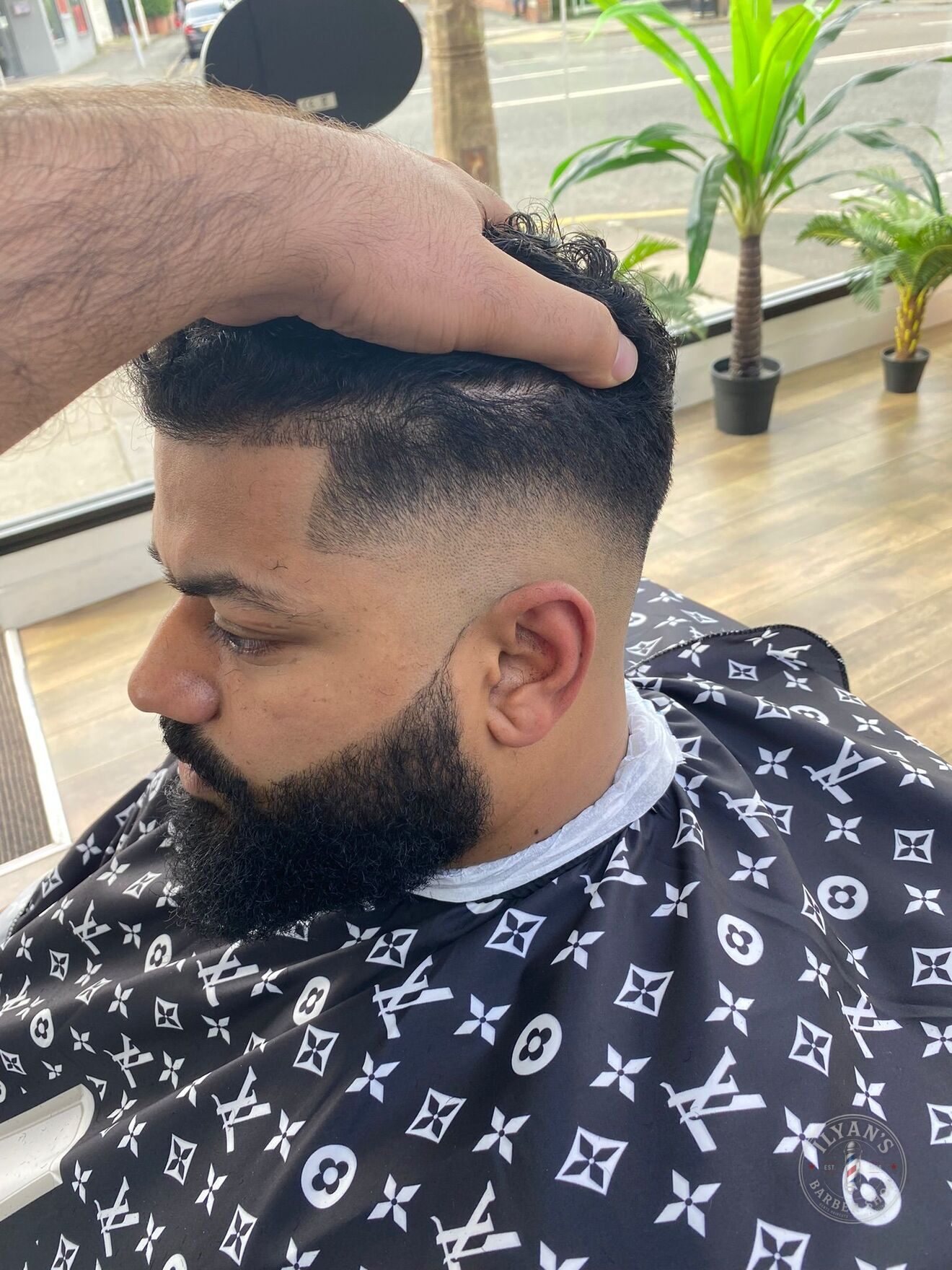 Curly Crop Fade with Beard at Ilyan's Barber Shop